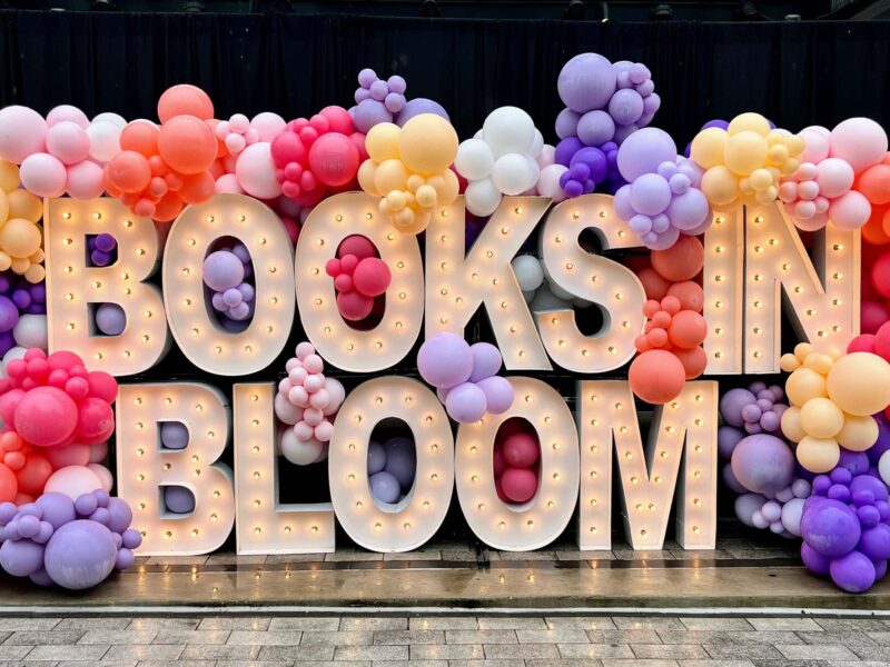 Books in Blooms sign with balloons